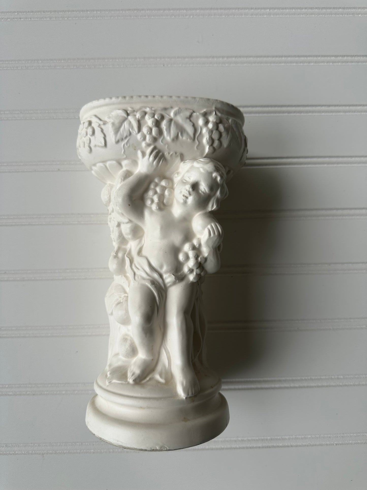 Ceramic cherub vase