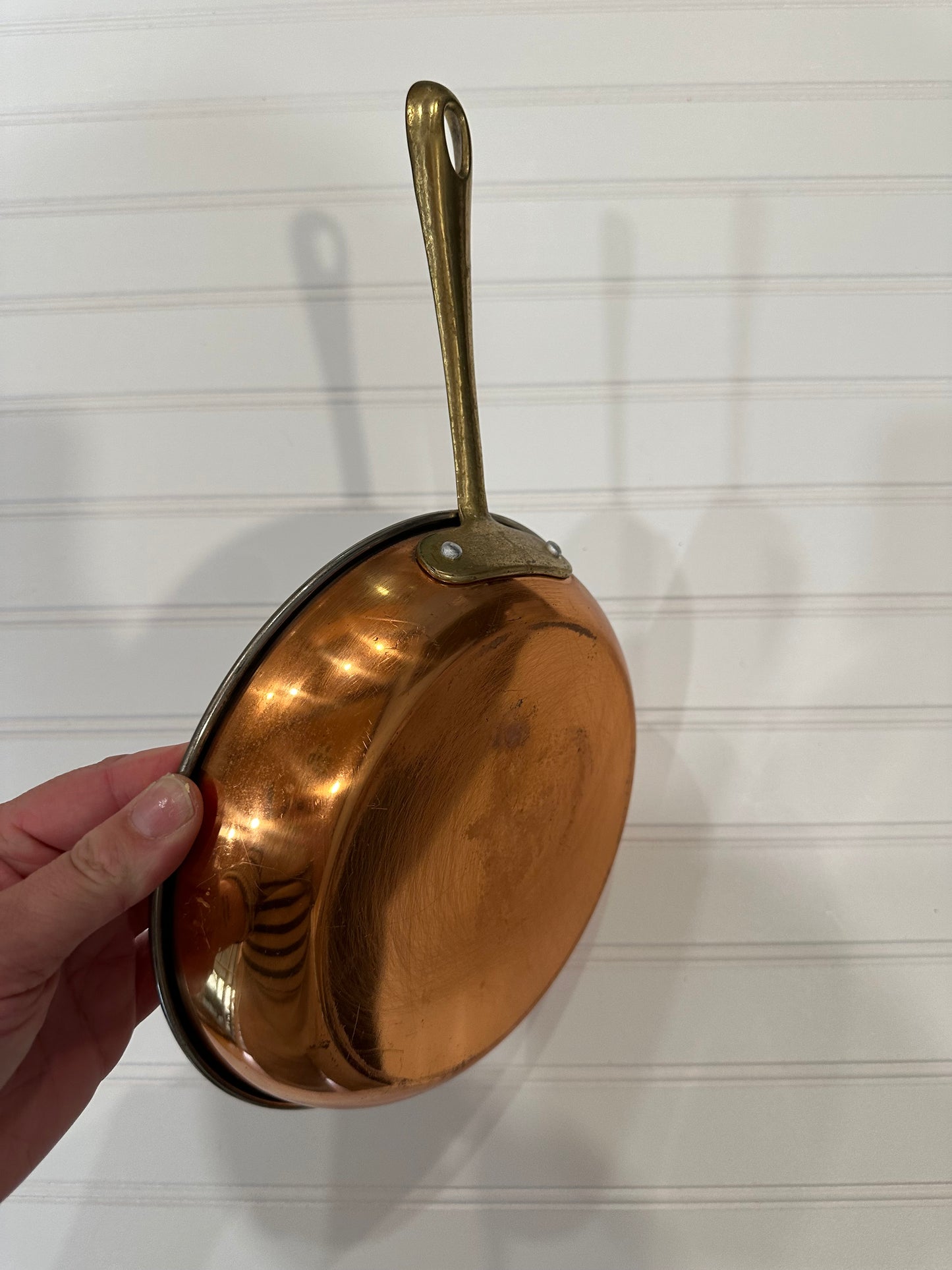 Copper pan with brass handle