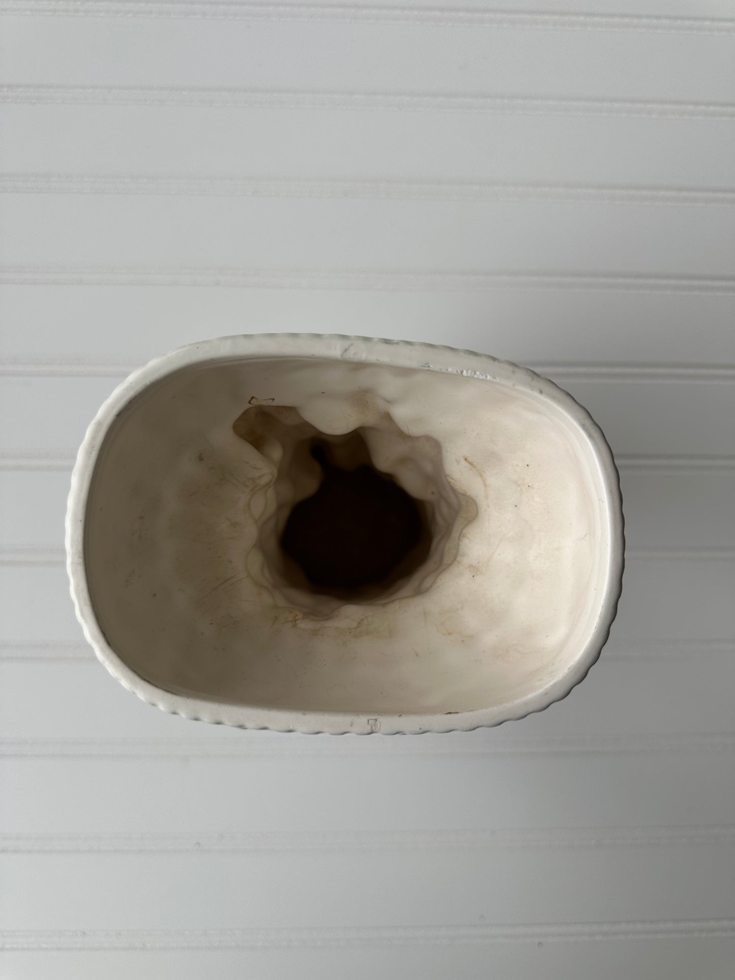 Ceramic cherub vase