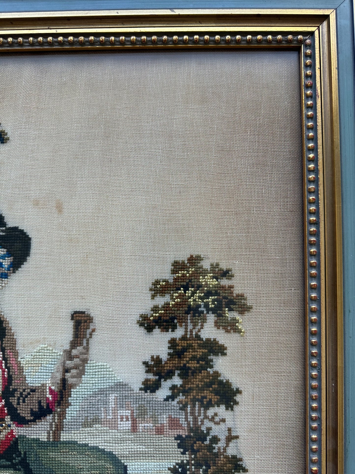 Antique framed Irishman needlepoint