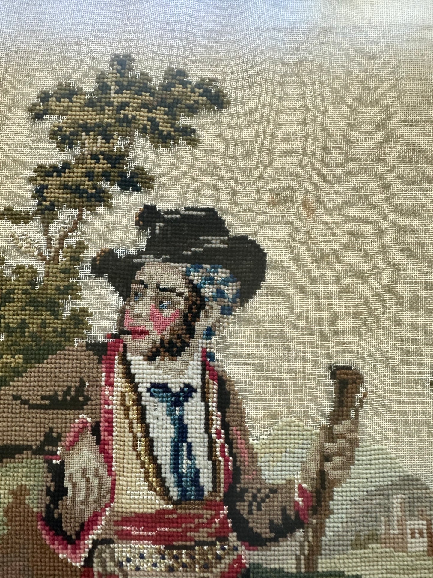 Antique framed Irishman needlepoint