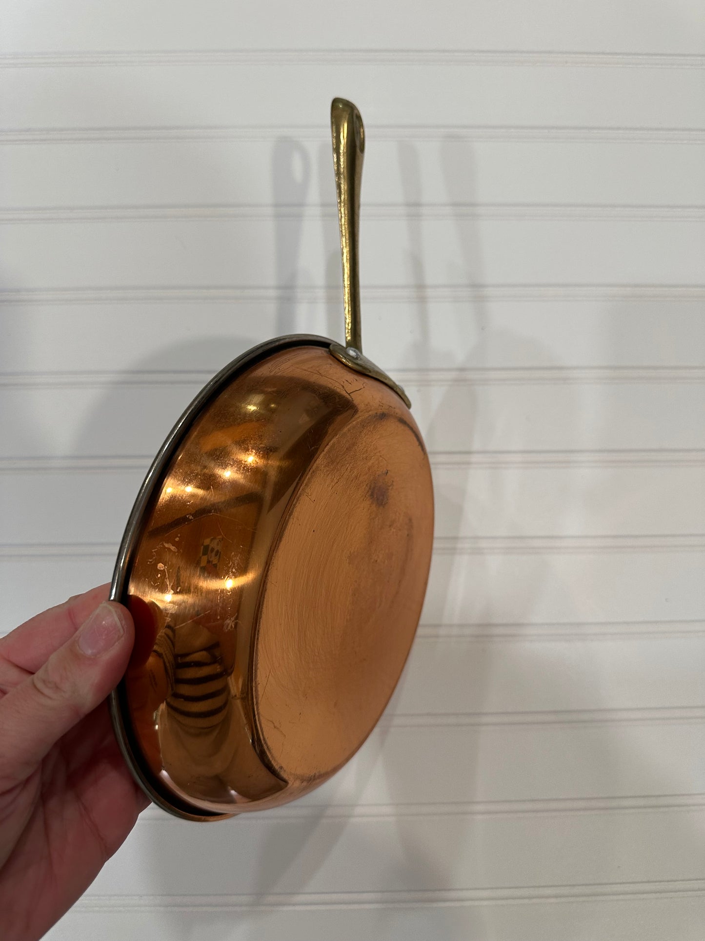 Copper pan with brass handle