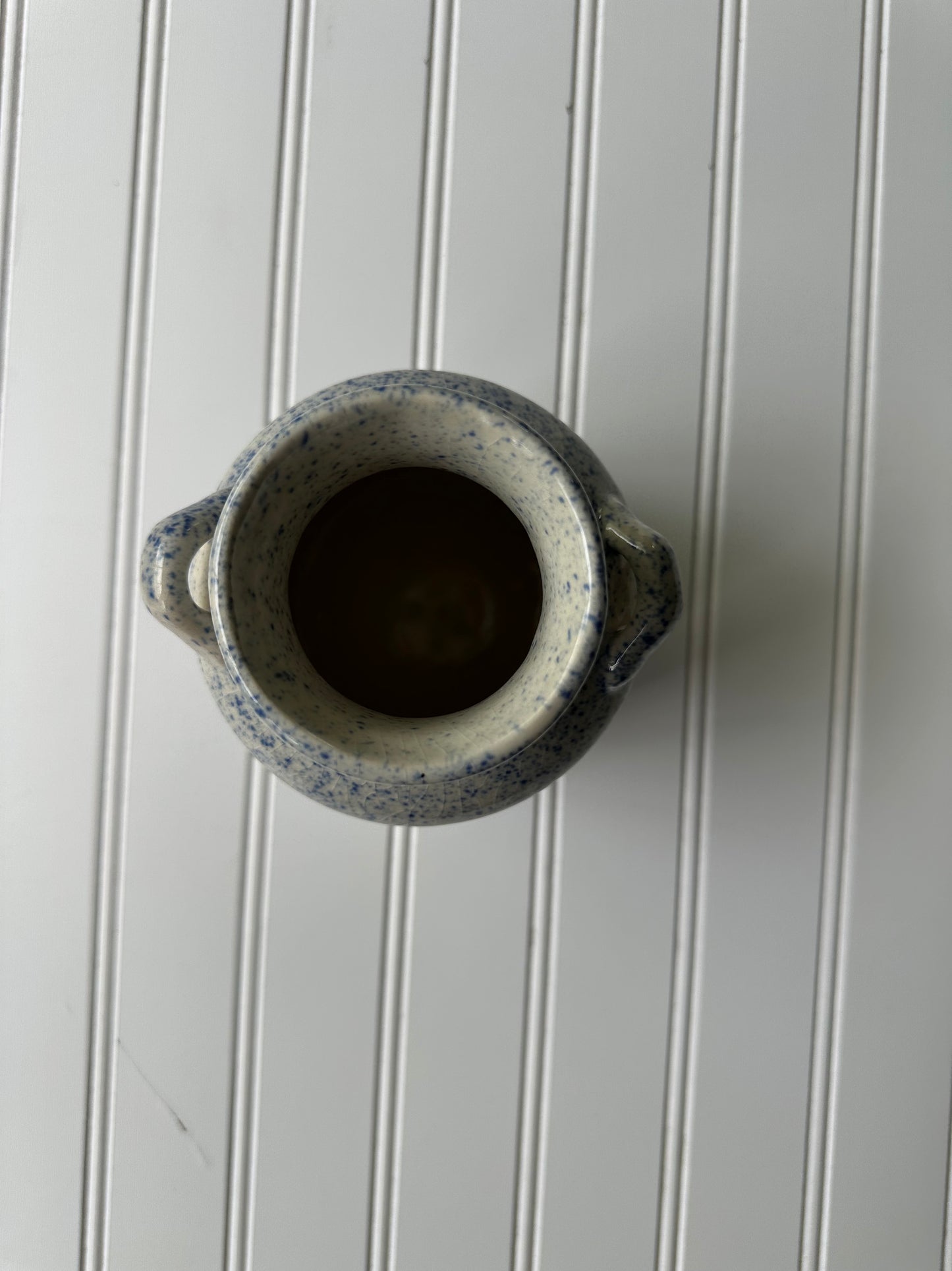 Blue splatterware pottery jug