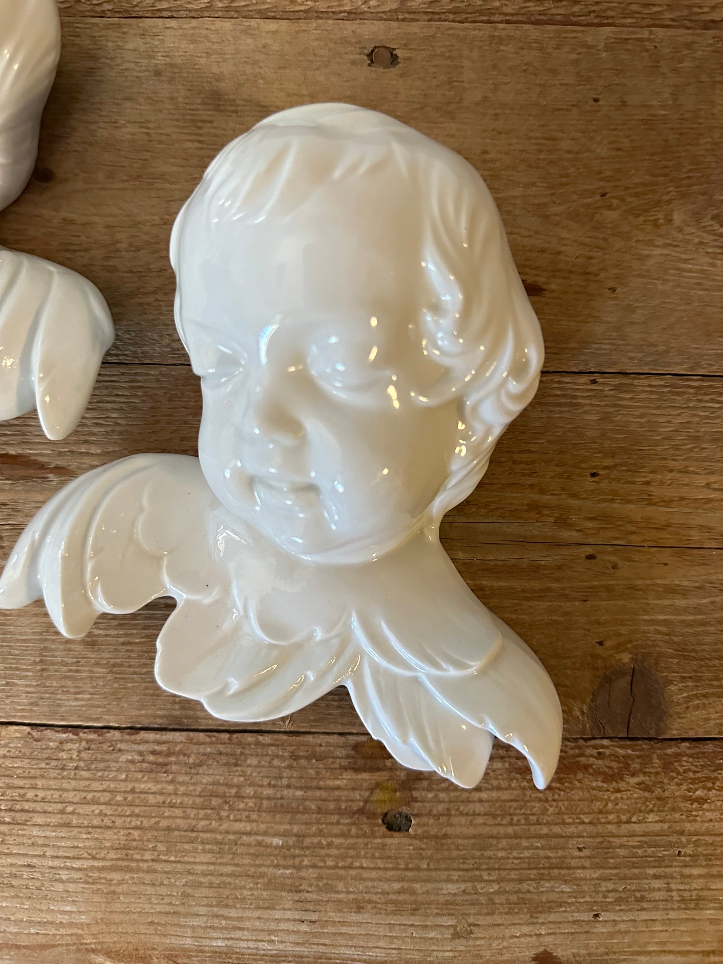 Pair of German ceramic cherubs