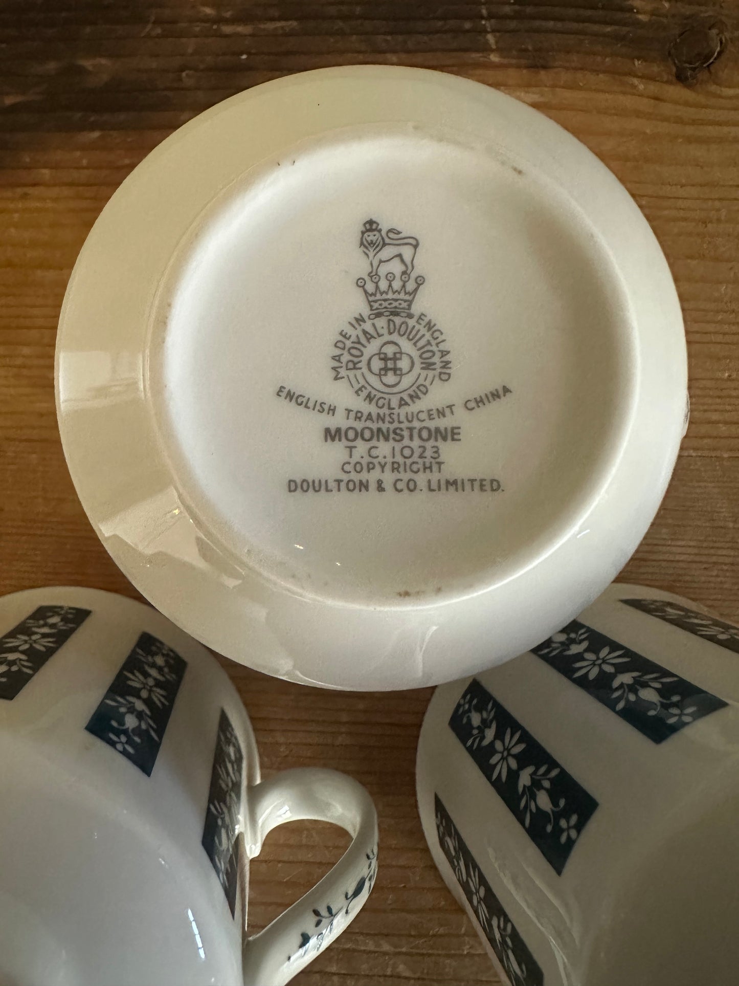 Set of three English moonstone mugs