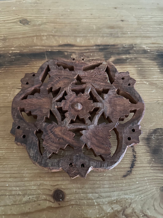 Hand carved wooden trivet