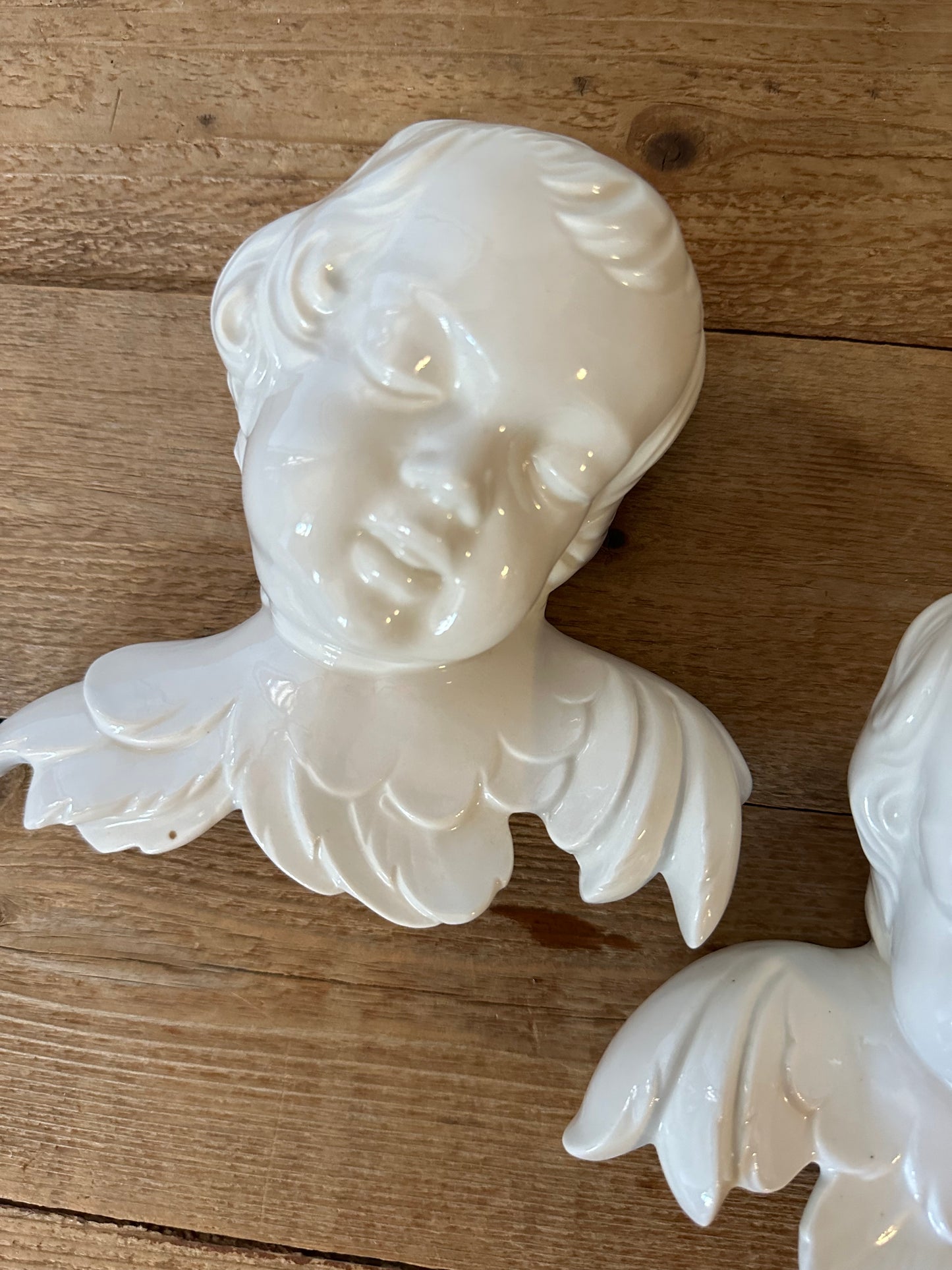 Pair of German ceramic cherubs