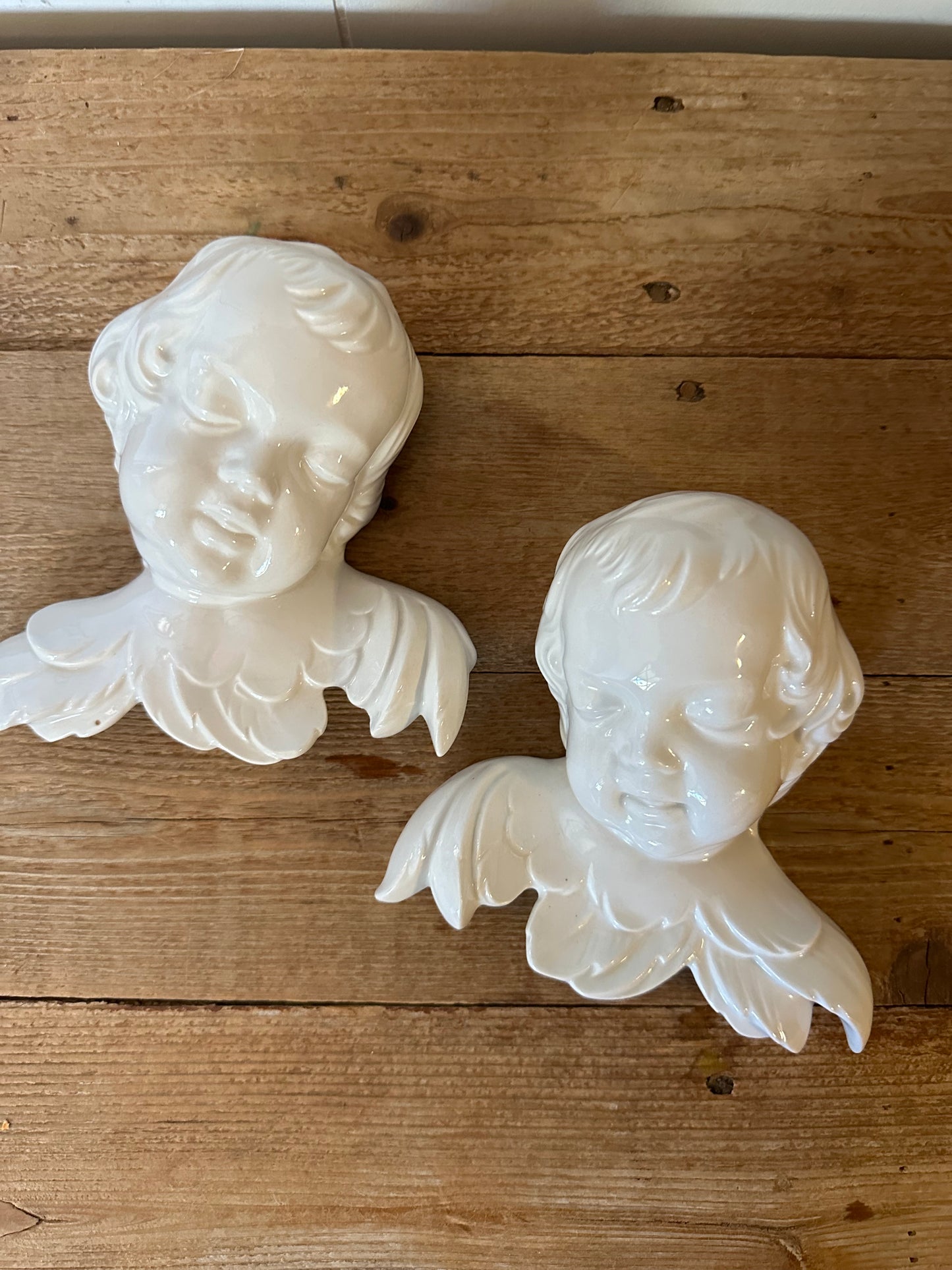 Pair of German ceramic cherubs